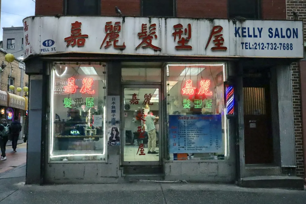 Neon-lit salon storefront in Chinatown